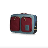 Topo Designs Global Briefcase in durable fabric with leather accents, featuring a sleek, professional design and multiple organizational compartments