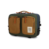 Topo Designs Global Briefcase in durable fabric with leather accents, featuring a sleek handle and multiple compartments for organization.