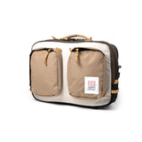 Topo Designs Global Briefcase, durable canvas briefcase with leather accents, featuring multiple compartments and a secure zipper closure.