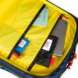 Topo Designs Global Travel Bag 40L carry-on luggage shown with durable fabric and adjustable straps for travel convenience.