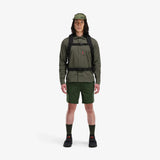Topo Designs Global Travel Bag 40L carry-on luggage in olive color, front view showing full-layer design and sturdy handle.