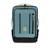 Topo Designs Global Travel Bag 40L carry-on luggage in Sea Pine color, showing front view with durable design and spacious storage.