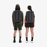 Topo Designs Global Travel Bag roller carry-on luggage with full zipper layering and durable handle for easy travel.