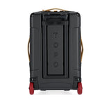 Topo Designs Global Travel Bag Roller carry-on luggage in bone white and olive, shown from the back with wheels and handle extended.