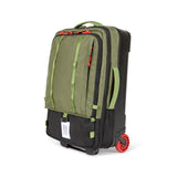 Topo Designs Global Travel Bag Roller carry-on luggage in durable fabric with multiple compartments and a telescoping handle.