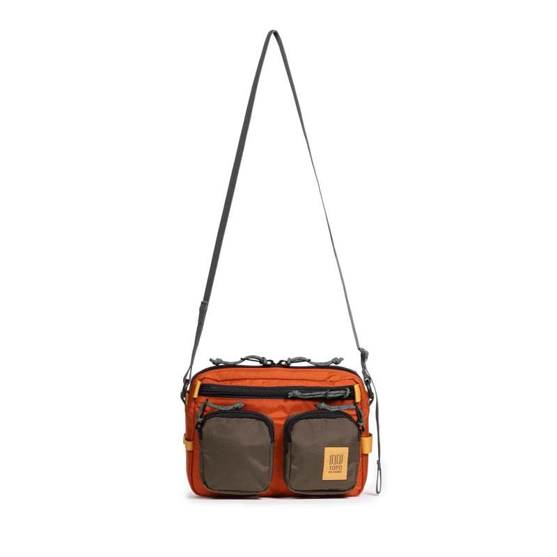 Topo Designs Block Bag crossbody bag with adjustable strap and front pocket, shown in a close-up view.