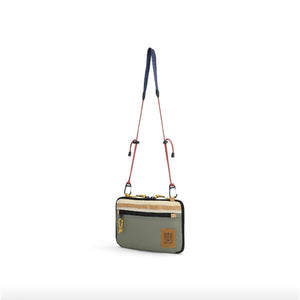 Topo Designs All Adventure Accessory Bag crossbody bag made of durable fabric with adjustable strap and multiple compartments.