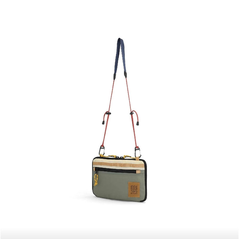 Topo Designs All Adventure Accessory Bag crossbody bag made of durable fabric with adjustable strap and multiple compartments.