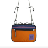 Topo Designs All Adventure Accessory Bag crossbody bag with adjustable strap and multiple compartments, shown in a sleek, compact design.