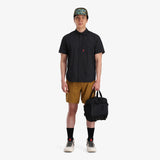 Black Topo Designs Mountain Cross Bag, unisex crossbody bag with front flap and adjustable strap, made for outdoor adventures.