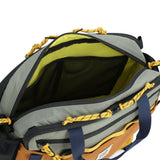Beetle Khaki Topo Designs Mountain Cross Bag in detail view, showing its compact crossbody style and durable fabric.