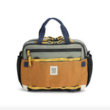 Topo Designs Mountain Cross Bag, a stylish black crossbody bag with adjustable strap and durable fabric for outdoor adventures.