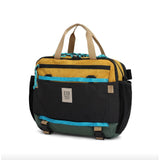 Topo Designs Mountain Cross Bag, a compact black crossbody bag with adjustable strap and durable fabric, ideal for outdoor use.