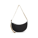 Black Topo Designs Moonlight Crossbody Bag shown from the back, featuring a sleek strap and minimalist design.