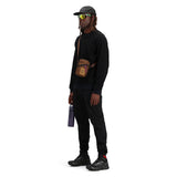 Black Topo Designs mini shoulder crossbody bag with adjustable strap and compact design, perfect for everyday carry.