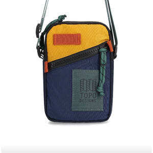 Topo Designs mini shoulder bag crossbody bag with adjustable strap and front pocket, made from durable fabric.