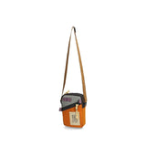 Topo Designs mini shoulder bag, a compact crossbody bag with adjustable strap and durable fabric, ideal for everyday use.