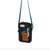 Topo Designs mini shoulder bag, a stylish crossbody bag with a durable design and adjustable strap, ideal for daily use.