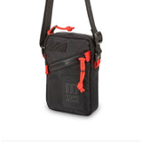 Topo Designs mini shoulder bag, crossbody style, made of durable fabric with adjustable strap and compact design.