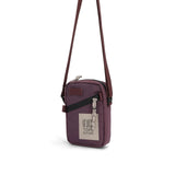 Topo Designs mini shoulder bag, a compact crossbody bag with durable fabric and adjustable strap, ideal for everyday use.