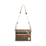 Topo Designs Mountain Accessory Shoulder Bag, a compact crossbody bag with adjustable strap and mountain-themed design, outdoor style.