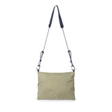 Topo Designs mountain accessory shoulder bag, a stylish crossbody bag with durable fabric and adjustable strap, suitable for outdoor use.