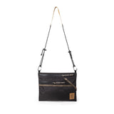 Topo Designs Mountain Accessory Shoulder Bag crossbody bag with adjustable strap and durable fabric, suitable for outdoor adventures.