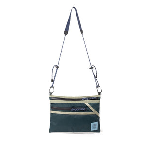 Topo Designs mountain accessory shoulder bag, crossbody style with durable fabric and adjustable strap, outdoor-inspired accessory.