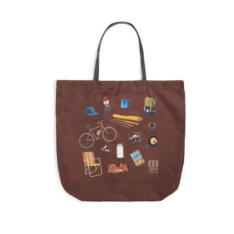 Topo Designs packable tote bag folded flat, lightweight and durable with top handles for easy carrying.