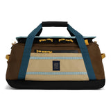 Topo Designs Mountain Duffel 40L in rugged fabric with handles and shoulder strap, ideal for travel and outdoor adventures.