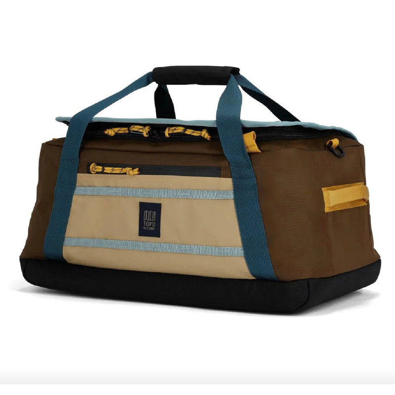 Topo Designs Mountain Duffel 40L in rugged fabric with carry handles and adjustable shoulder strap, ideal for travel and outdoor adventures.
