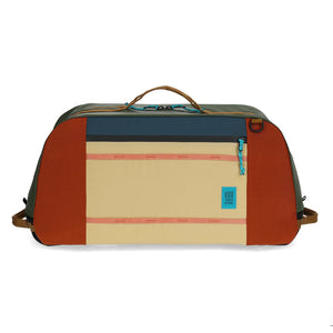 Topo Designs Mountain Duffel 70L in durable fabric with black straps, spacious for travel or outdoor adventures.
