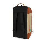 Topo Designs Mountain Duffel 70L in durable, rugged fabric with top carry handles and adjustable shoulder strap.