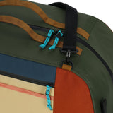 Topo Designs Mountain Duffel 70L in rugged navy with sturdy handles and a spacious main compartment for outdoor gear storage.