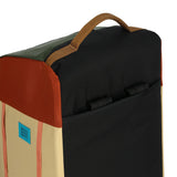 Topo Designs Mountain Duffel 70L in durable fabric, showing its spacious design and sturdy handles for travel and outdoor adventures.
