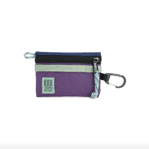 Topo Designs Accessory Bag Micro for packing organization, showing compact zippered storage with multiple compartments
