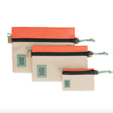 Topo Designs accessory bag bundle with micro, small, and medium packing organizers for travel and organization.