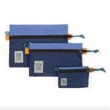 Topo Designs accessory bag bundle with micro, small, and medium packing organizers for travel and organization.