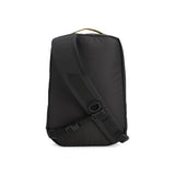 Black Topo Designs Mountain Sling Bag, back view showing adjustable strap and compact design for outdoor use.