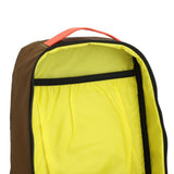 Topo Designs Mountain Sling Bag in desert palm color, showcasing compact design and adjustable strap for outdoor adventures.