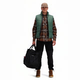 Topo Designs mountain gear tote bag showing sturdy canvas material, top handles, and spacious interior for outdoor essentials.