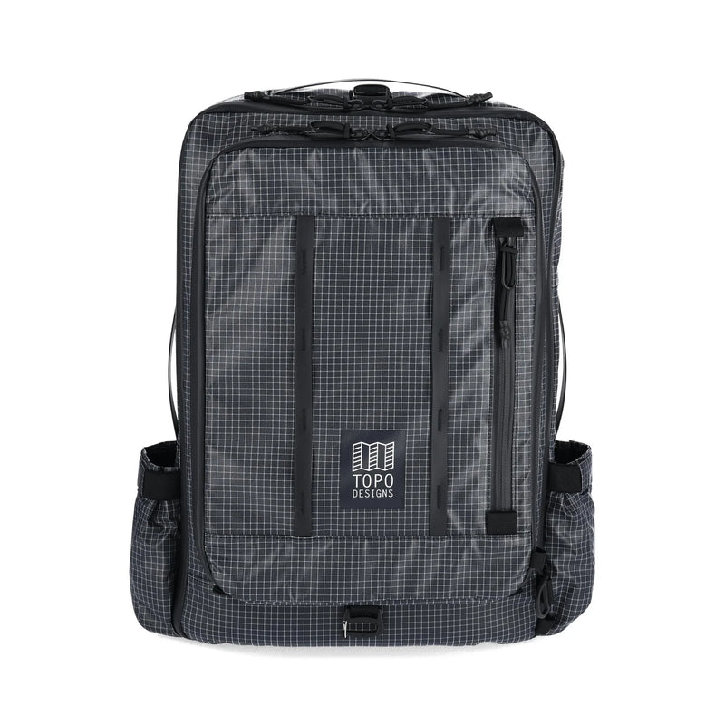 Topo Designs Apex Travel Bag 30L showing the durable nylon exterior, adjustable straps, and spacious main compartment.