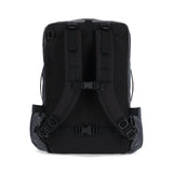 Topo Designs Apex Travel Bag 30L, a sleek black travel backpack with padded straps and multiple compartments for organization.