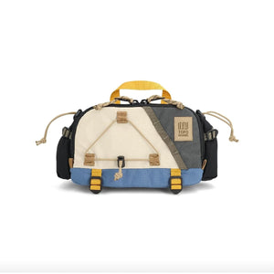 Topo Designs Mountain Hydro Hip Pack, a compact waist pack with water bottle holder and adjustable straps for outdoor adventures.