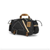 Topo Designs Mountain Hydro Hip Pack, a black waist pack with adjustable strap and water bottle holder for outdoor adventures.