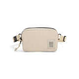 Topo Designs Ripstop Belt Bag in bone white, front view showing durable ripstop fabric and adjustable waist strap.