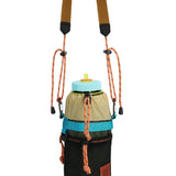 Topo Designs Mountain Hydro Sling water bottle sling in olive, featuring a compact design with adjustable strap and secure closure.