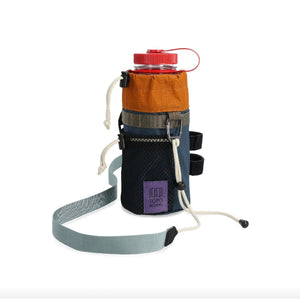 Topo Designs Mountain Hydro Sling water bottle sling with adjustable strap, designed for outdoor hydration and portability.