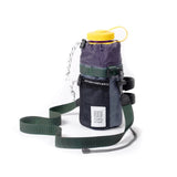 Topo Designs Mountain Hydro Sling water bottle sling in durable fabric with adjustable strap and water bottle holder.