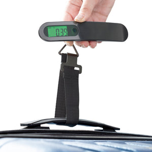 Travelon rechargeable luggage scale displaying weight measurement with digital screen and compact design for travel accessories.